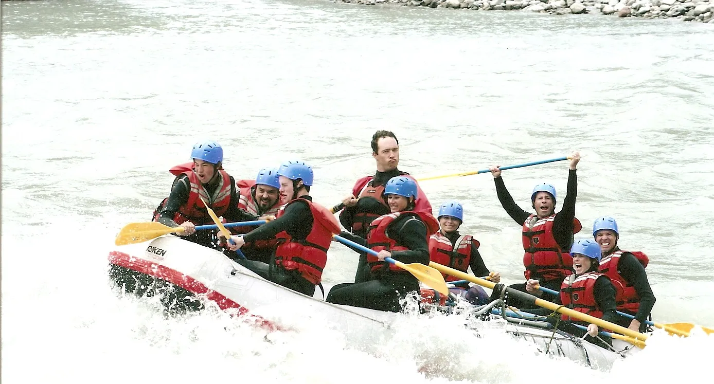 A team river-rafting together